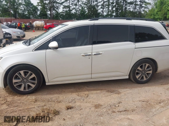 2015 Honda Odyssey Touring Elite with VIN 5FNRL5H96FB045968, listed as a IAAI auction lot 42263637 with 207,637 mi miles and . Bid and sale history available at DreamBid. Image 14.