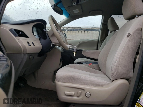 2014 Toyota Sienna LE AAS with VIN 5TDKK3DC7ES466988, listed as a Copart auction lot 53277255 with 130,706 mi miles and Salvage Title. Bid and sale history available at carsss.com. Image 7.