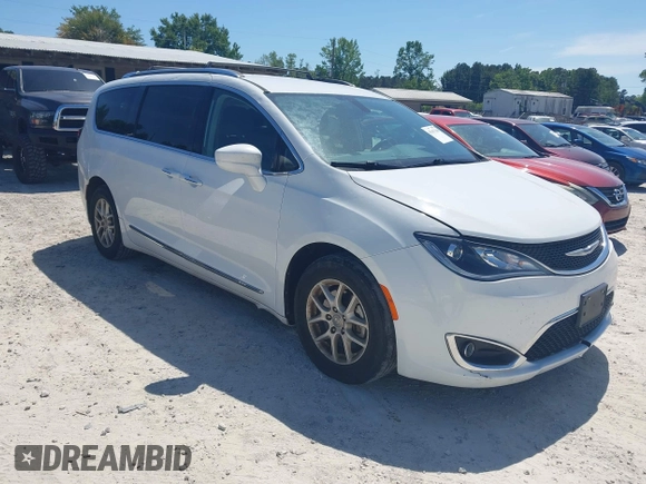 2020 Chrysler Pacifica Touring L z VIN 2C4RC1BG6LR276742, wystawiony jako IAAI lot #42167284 z przebiegiem 123 668 mil mil oraz . Historia ofert i sprzedaży dostępna na DreamBid. Obrazek 1.