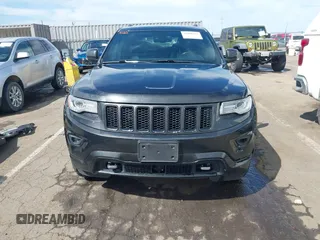 2014 Jeep Grand Cherokee Overland with VIN 1C4RJFCT8EC106005, listed as a IAAI auction lot 41989721 with 148,469 mi miles and . Bid and sale history available at DreamBid. Image 13.