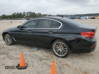 2018 BMW 5 Series 530i with VIN WBAJA5C54JG899845, listed as a Copart auction lot 83007584 with 57,379 mi miles and Salvage Title. Bid and sale history available at DreamBid. Image 2.