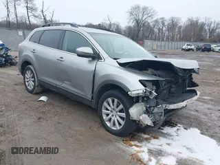 2010 Mazda CX-9 Sport with VIN JM3TB2MV4A0215219, listed as a IAAI auction lot 41556257 with 247,813 mi miles. Bid and sale history available at carsss.com. Image 1.