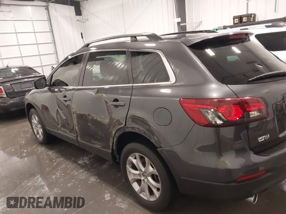 2015 Mazda CX-9 Sport with VIN JM3TB2BA1F0453620, listed as a IAAI auction lot 41330887 with 119,219 mi miles and . Bid and sale history available at carsss.com. Image 14.