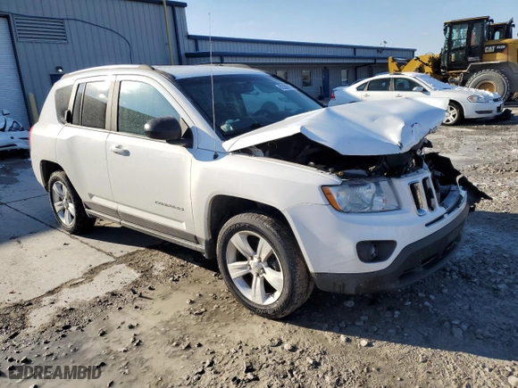 2012 Jeep Compass Latitude with VIN 1C4NJCEA4CD683789, listed as a Copart auction lot 82559954 with 115,602 mi miles and Salvage Title. Bid and sale history available at carsss.com. Image 4.