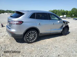 2020 Lincoln Nautilus Reserve z VIN 2LMPJ6K99LBL24884, wystawiony jako Copart lot #57211065 z przebiegiem 24 008 mil mil oraz Szkoda całkowita • Salvage title. Historia ofert i sprzedaży dostępna na DreamBid. Obrazek 3.