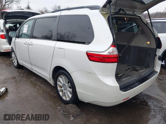 2015 Toyota Sienna Ltd with VIN 5TDDK3DC9FS115784, listed as a IAAI auction lot 41355934 with 125,675 mi miles. Bid and sale history available at carsss.com. Image 3.