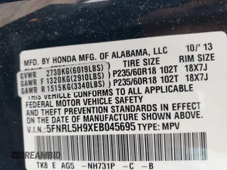 2014 Honda Odyssey Touring with VIN 5FNRL5H9XEB045695, listed as a IAAI auction lot 41545348 with 131,472 mi miles and . Bid and sale history available at carsss.com. Image 9.