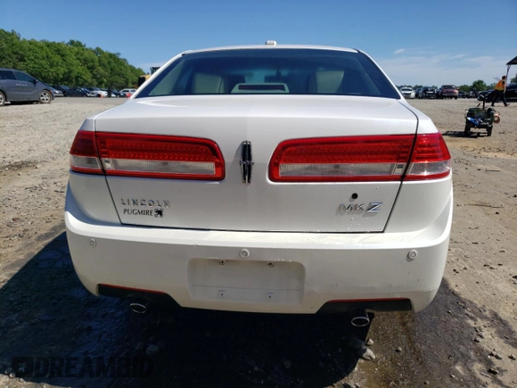 2012 Lincoln MKZ z VIN 3LNHL2GC3CR800619, wystawiony jako Copart lot #57872365 z przebiegiem 66 280 mil mil oraz Szkoda całkowita • Salvage title. Historia ofert i sprzedaży dostępna na DreamBid. Obrazek 6.