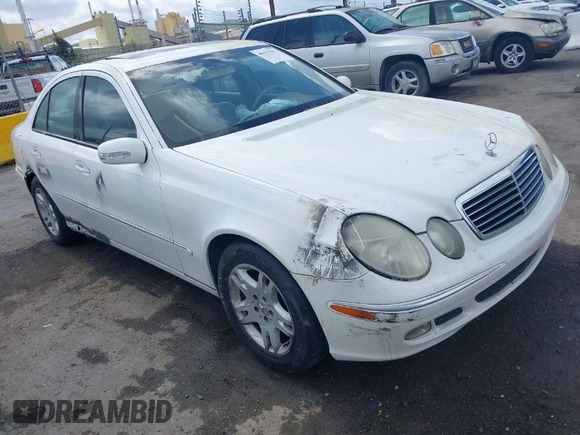 2003 Mercedes-Benz E-Class 3.2L with VIN WDBUF65J23A120318, listed as a IAAI auction lot 41927993 with 113,578 mi miles. Bid and sale history available at carsss.com. Image 1.
