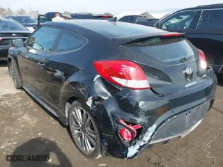 2016 Hyundai Veloster Turbo with VIN KMHTC6AE8GU255625, listed as a IAAI auction lot 41479623 with 94,011 mi miles. Bid and sale history available at carsss.com. Image 3.