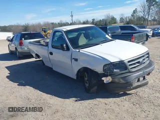 2003 Ford F-150 XL with VIN 2FTRF17W03CA59388, listed as a IAAI auction lot 41673651 with 221,668 mi miles. Bid and sale history available at carsss.com. Image 1.