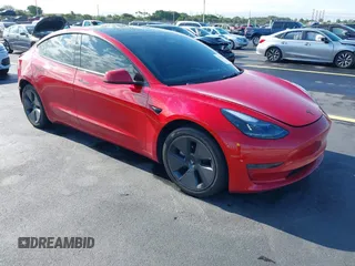 2023 Tesla Model 3 with VIN 5YJ3E1EA2PF588467, listed as a IAAI auction lot 42254921 with 11,217 mi miles and . Bid and sale history available at DreamBid. Image 1.