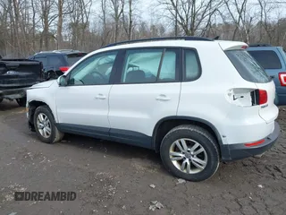 2017 Volkswagen Tiguan S with VIN WVGBV7AX3HK020883, listed as a IAAI auction lot 41782168 with 87,650 mi miles and . Bid and sale history available at DreamBid. Image 14.