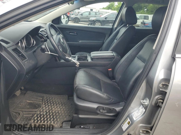 2014 Mazda CX-9 Touring с VIN JM3TB2CA2E0431879, выставлен на аукционе Copart как лот 64778845 с пробегом 145 476 миль миль и Чистый • Clean title. История ставок и продаж доступна на DreamBid. Изображение 7.