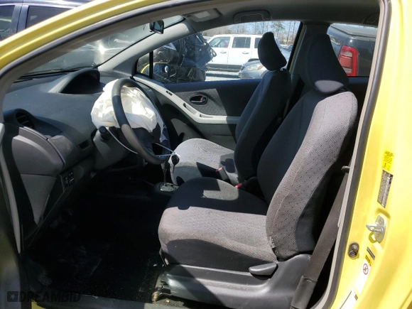 2009 Toyota Yaris with VIN JTDJT903195276164, listed as a Copart auction lot 50129115 with 165,824 mi miles and Salvage Title. Bid and sale history available at carsss.com. Image 7.