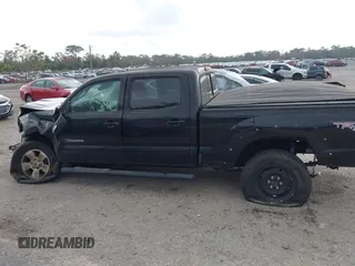 2013 Toyota Tacoma with VIN 3TMMU4FN5DM052257, listed as a IAAI auction lot 41260265 with 121,882 mi miles. Bid and sale history available at carsss.com. Image 14.