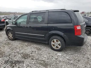 2010 Dodge Grand Caravan SXT with VIN 2D4RN5DX4AR124702, listed as a Copart auction lot 51654365 with 231,910 mi miles and Salvage Title. Bid and sale history available at DreamBid. Image 2.