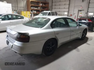 2000 Pontiac Bonneville SLE z VIN 1G2HY54K8Y4266136, wystawiony jako IAAI lot #37856460 z przebiegiem 190 979 mil mil oraz . Historia ofert i sprzedaży dostępna na DreamBid. Obrazek 4.