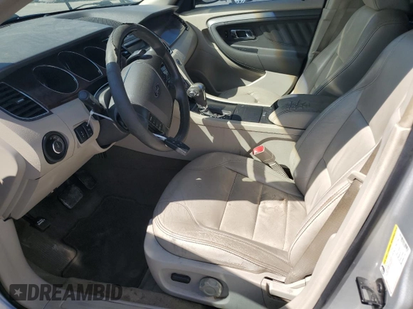 2011 Ford Taurus SEL with VIN 1FAHP2EWXBG175623, listed as a Copart auction lot 68707944 with 185,826 mi miles and Salvage Title. Bid and sale history available at DreamBid. Image 7.