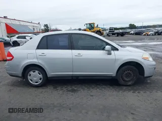 2007 Nissan Versa 1.8 SL with VIN 3N1BC11E97L447829, listed as a IAAI auction lot 41612386 with 123,500 mi miles. Bid and sale history available at carsss.com. Image 13.