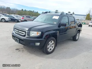 2011 Honda Ridgeline RTS with VIN 5FPYK1F4XBB453373, listed as a IAAI auction lot 41837086 with 268,041 mi miles. Bid and sale history available at carsss.com. Image 2.