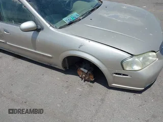 2000 Nissan Maxima GXE z VIN JN1CA31D3YT722606, wystawiony jako IAAI lot #42449273 z przebiegiem Nie podano mil oraz . Historia ofert i sprzedaży dostępna na DreamBid. Obrazek 11.