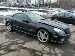 2009 Mercedes-Benz SL 550 with VIN WDBSK71F29F152210, listed as a Copart auction lot 44854165 with 69,777 mi miles and Salvage title. Bid and sale history available at DreamBid. Image 4.