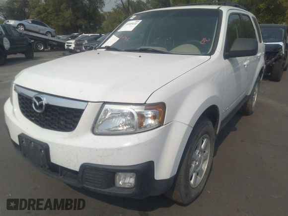 2008 Mazda Tribute Touring with VIN 4F2CZ96138KM32735, listed as a IAAI auction lot 31145122 with 206,608 mi miles and . Bid and sale history available at DreamBid. Image 6.
