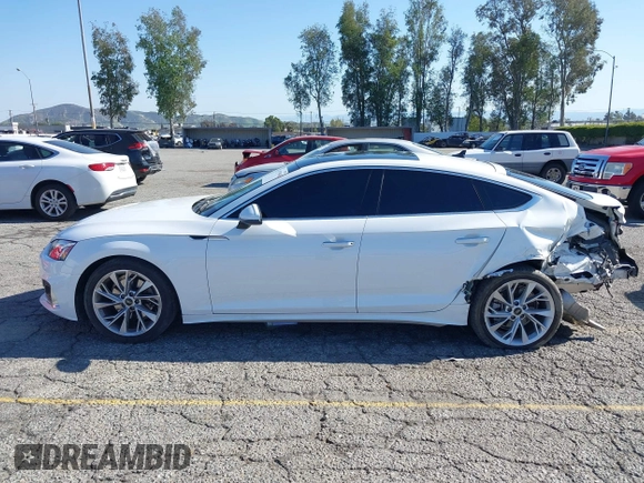 2023 Audi A5 Sportback Premium z VIN WAUABCF56PA039597, wystawiony jako IAAI lot #41979540 z przebiegiem 32 654 mil mil oraz . Historia ofert i sprzedaży dostępna na DreamBid. Obrazek 14.