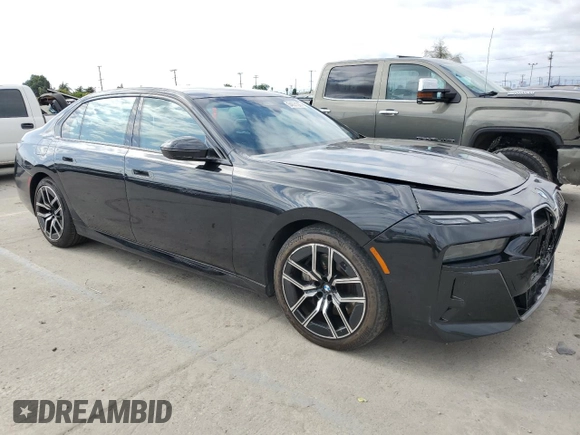 2024 BMW 7 Series 740i with VIN WBA23EH03RCP67206, listed as a Copart auction lot 54631285 with 22,901 mi miles and Salvage title. Bid and sale history available at DreamBid. Image 4.