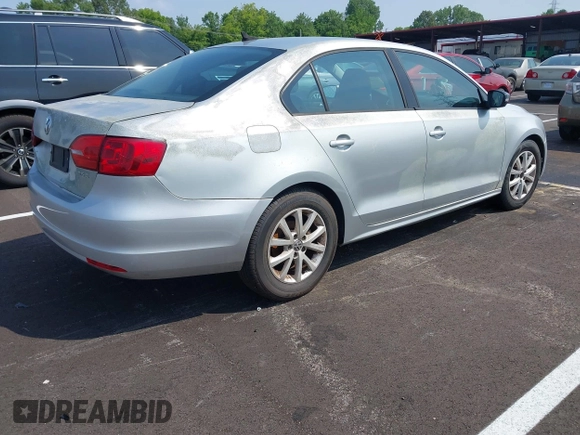 2012 Volkswagen Jetta SE z VIN 3VWDP7AJ4CM468986, wystawiony jako IAAI lot #42429171 z przebiegiem 169 447 mil mil oraz . Historia ofert i sprzedaży dostępna na DreamBid. Obrazek 4.