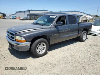 2001 Dodge Dakota with VIN 1B7HL2AX51S296141, listed as a Copart auction lot 63282445 with 61,567 mi miles and Clean title. Bid and sale history available at DreamBid. Image 1.