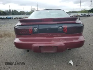 2000 Pontiac Firebird Firebird z VIN 2G2FS22K6Y2143127, wystawiony jako Copart lot #72041384 z przebiegiem 181 787 mil mil oraz Szkoda całkowita • Salvage title. Historia ofert i sprzedaży dostępna na DreamBid. Obrazek 6.