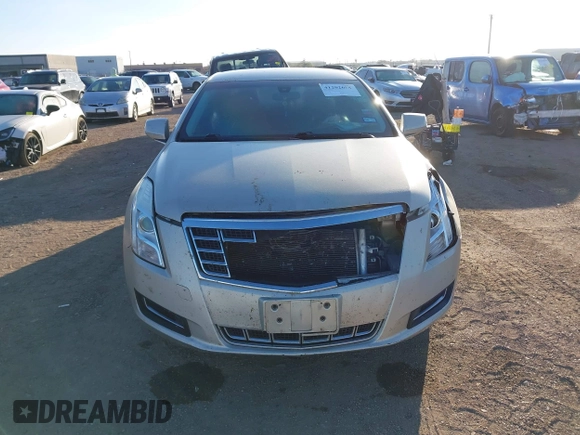 2014 Cadillac XTS with VIN 2G61L5S30E9207777, listed as a IAAI auction lot 41202654 with 112,565 mi miles. Bid and sale history available at carsss.com. Image 12.