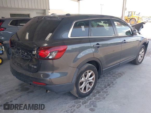 2014 Mazda CX-9 Touring with VIN JM3TB2CA9E0443012, listed as a IAAI auction lot 42159985 with 156,352 mi miles and . Bid and sale history available at DreamBid. Image 4.