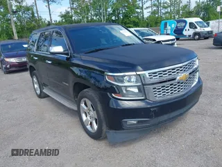 2015 Chevrolet Tahoe LT with VIN 1GNSCBKC1FR615817, listed as a IAAI auction lot 41760474 with 242,148 mi miles and . Bid and sale history available at DreamBid. Image 1.