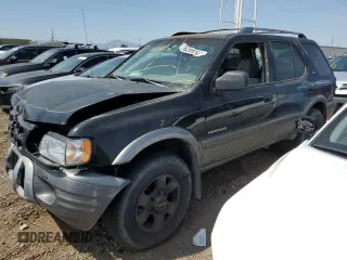 2001 Isuzu Rodeo S with VIN 4S2CK58W614344850, listed as a Copart auction lot 63807664 with 176,203 mi miles and Salvage Title. Bid and sale history available at DreamBid. Image 1.