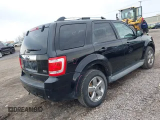 2012 Ford Escape Limited with VIN 1FMCU9EG6CKB47536, listed as a IAAI auction lot 42049336 with 106,341 mi miles. Bid and sale history available at carsss.com. Image 4.