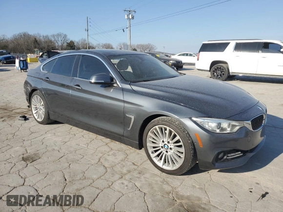 2015 BMW 4 Series 428i with VIN WBA4A9C52FD416219, listed as a Copart auction lot 48703365 with 87,162 mi miles and Clean title. Bid and sale history available at DreamBid. Image 4.