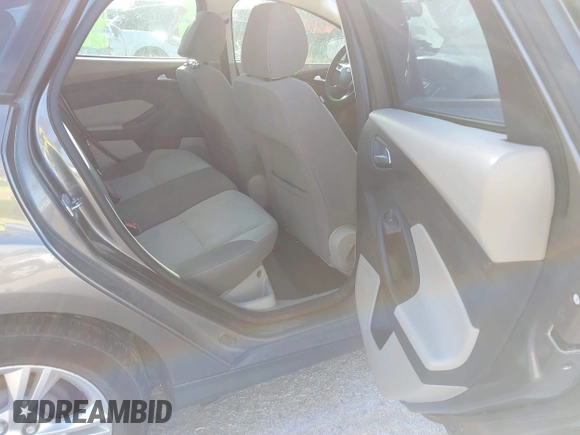 2013 Ford Focus SE with VIN 1FADP3K29DL220311, listed as a IAAI auction lot 41790487 with 136,257 mi miles. Bid and sale history available at carsss.com. Image 8.