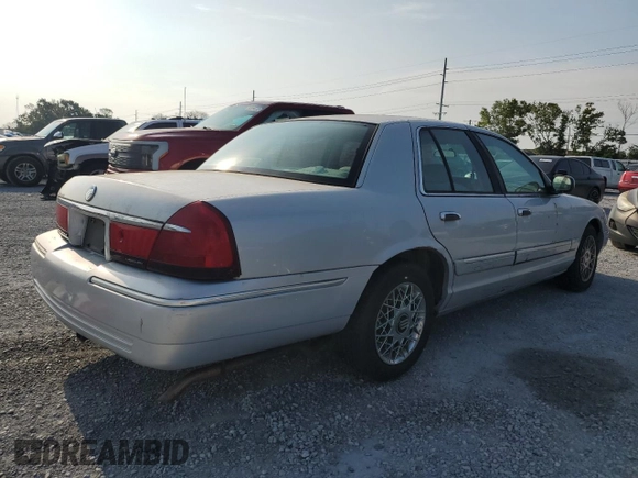 2000 Mercury Grand Marquis GS z VIN 2MEFM74W0YX715104, wystawiony jako Copart lot #54357855 z przebiegiem 111 231 mil mil oraz Szkoda całkowita • Salvage title. Historia ofert i sprzedaży dostępna na DreamBid. Obrazek 3.