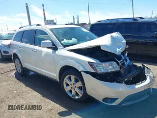 2014 Dodge Journey Limited with VIN 3C4PDCDG6ET105728, listed as a IAAI auction lot 41859746 with 184,335 mi miles and . Bid and sale history available at DreamBid. Image 1.
