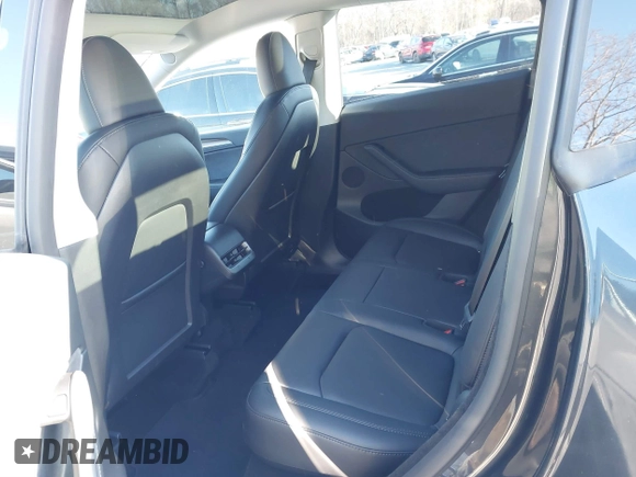 2024 Tesla Model Y Long Range with VIN 7SAYGDEE7RF199673, listed as a IAAI auction lot 41263305 with 3,137 mi miles and . Bid and sale history available at DreamBid. Image 8.