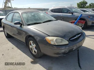 2002 Ford Taurus SE Standard with VIN 1FAFP53U12G147672, listed as a Copart auction lot 62173665 with 161,369 mi miles and Salvage title. Bid and sale history available at DreamBid. Image 4.