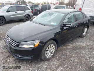 2014 Volkswagen Passat Wolfsburg Ed with VIN 1VWAT7A31EC098634, listed as a IAAI auction lot 41924146 with 80,872 mi miles. Bid and sale history available at carsss.com. Image 2.