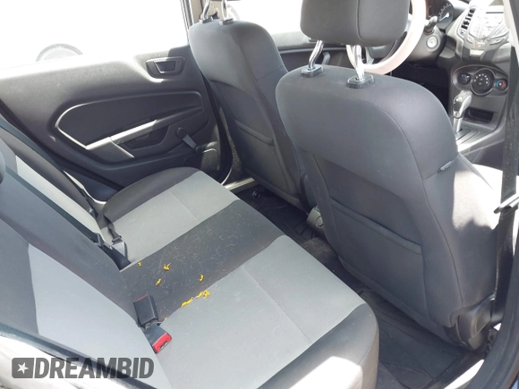 2016 Ford Fiesta S with VIN 3FADP4TJ8GM171214, listed as a IAAI auction lot 42582098 with 62,074 mi miles and . Bid and sale history available at DreamBid. Image 8.