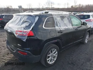 2016 Jeep Cherokee Latitude z VIN 1C4PJMCB6GW345413, wystawiony jako IAAI lot #41216995 z przebiegiem 254 311 mil mil oraz . Historia ofert i sprzedaży dostępna na DreamBid. Obrazek 4.