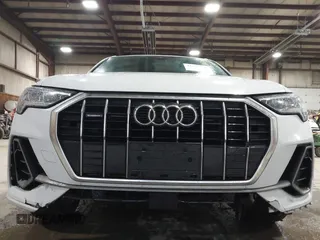 2021 Audi Q3 S line Premium Plus with VIN WA1EECF31M1060356, listed as a IAAI auction lot 42242850 with 83,380 mi miles and . Bid and sale history available at DreamBid. Image 6.
