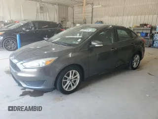 2015 Ford Focus SE with VIN 1FADP3F2XFL297766, listed as a Copart auction lot 62372075 with 203,625 mi miles and Salvage title. Bid and sale history available at DreamBid. Image 1.