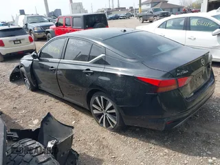 2019 Nissan Altima 2.5 SR with VIN 1N4BL4CV9KC259978, listed as a IAAI auction lot 42019056 with 159,471 mi miles. Bid and sale history available at carsss.com. Image 3.